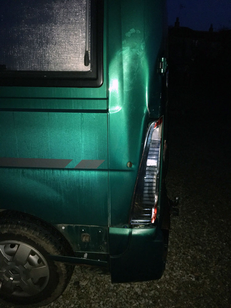 Rear corner damage to Renault Master campervan